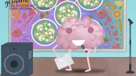 Screenshot des Videos, Brainy singt - im Hintergrund ein bunter Teller